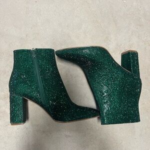 Studded green block heel ankle boots.
